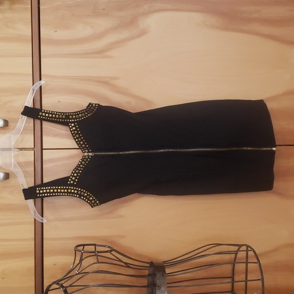 Forever 21 Dresses & Skirts - Forever 21 Zip front, bodycon dress. A couple of missing hardwear.